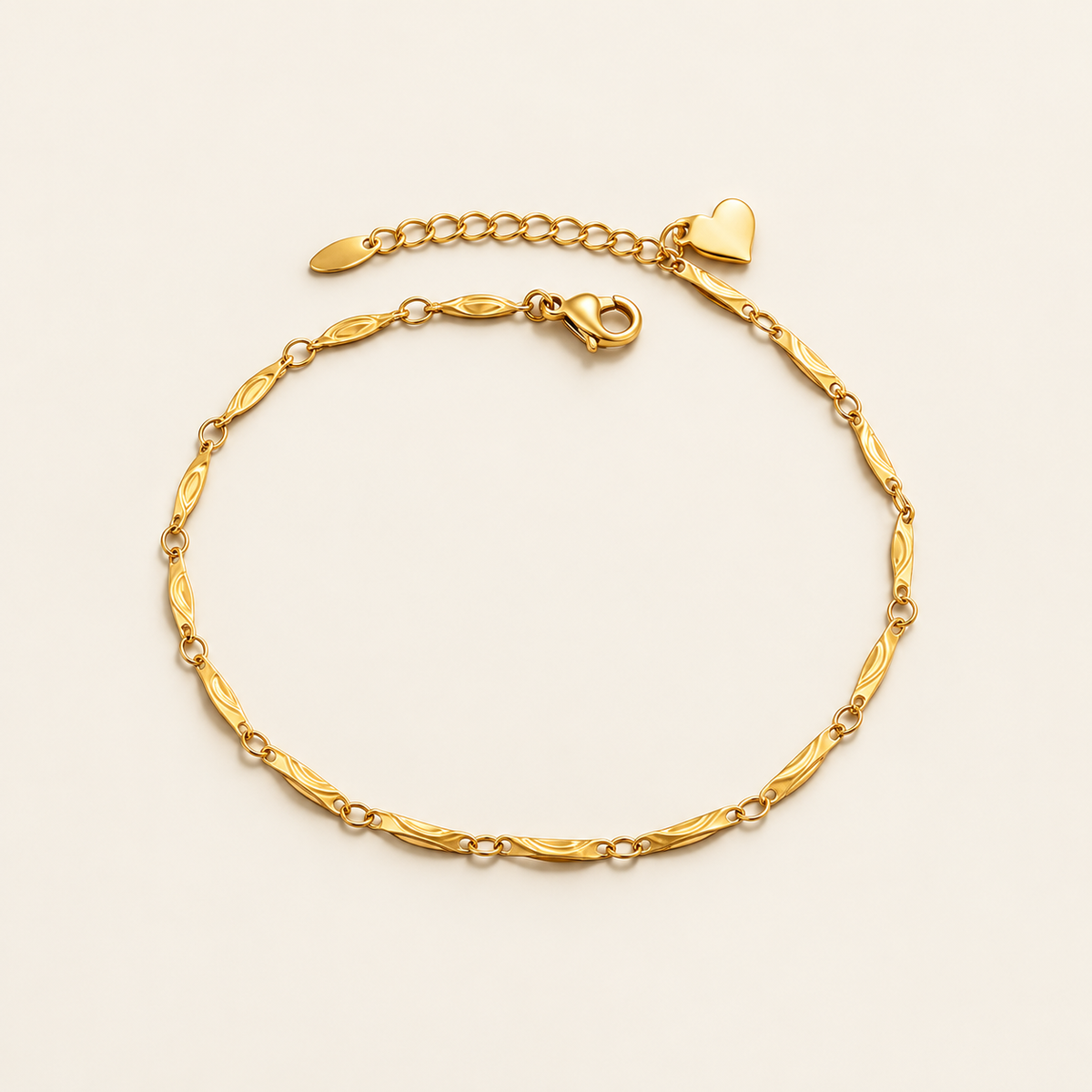 Gold Heart Chain Anklet — warm ivory background
