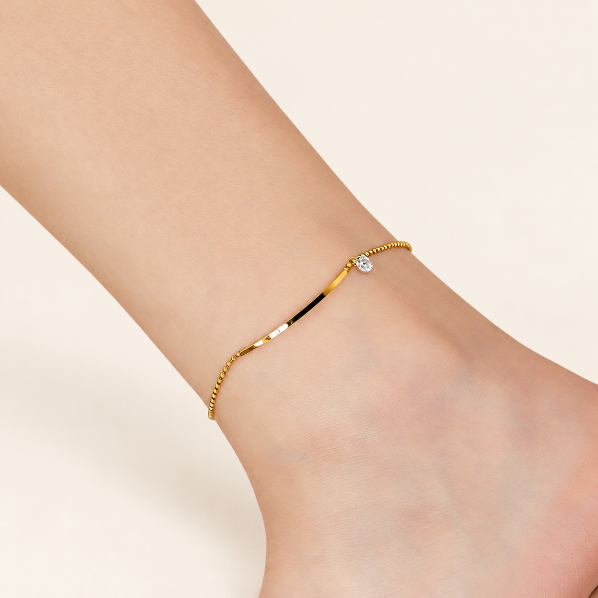 Crystal Bar Anklet — warm ivory background