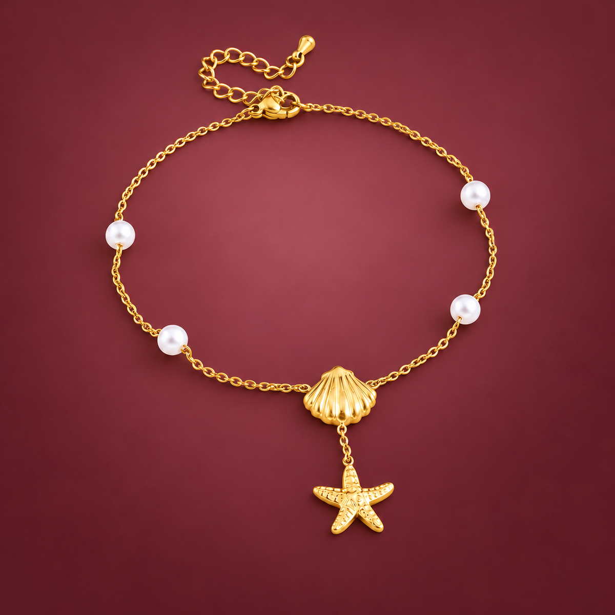 Shell Starfish Pearl Anklet — muted burgundy background