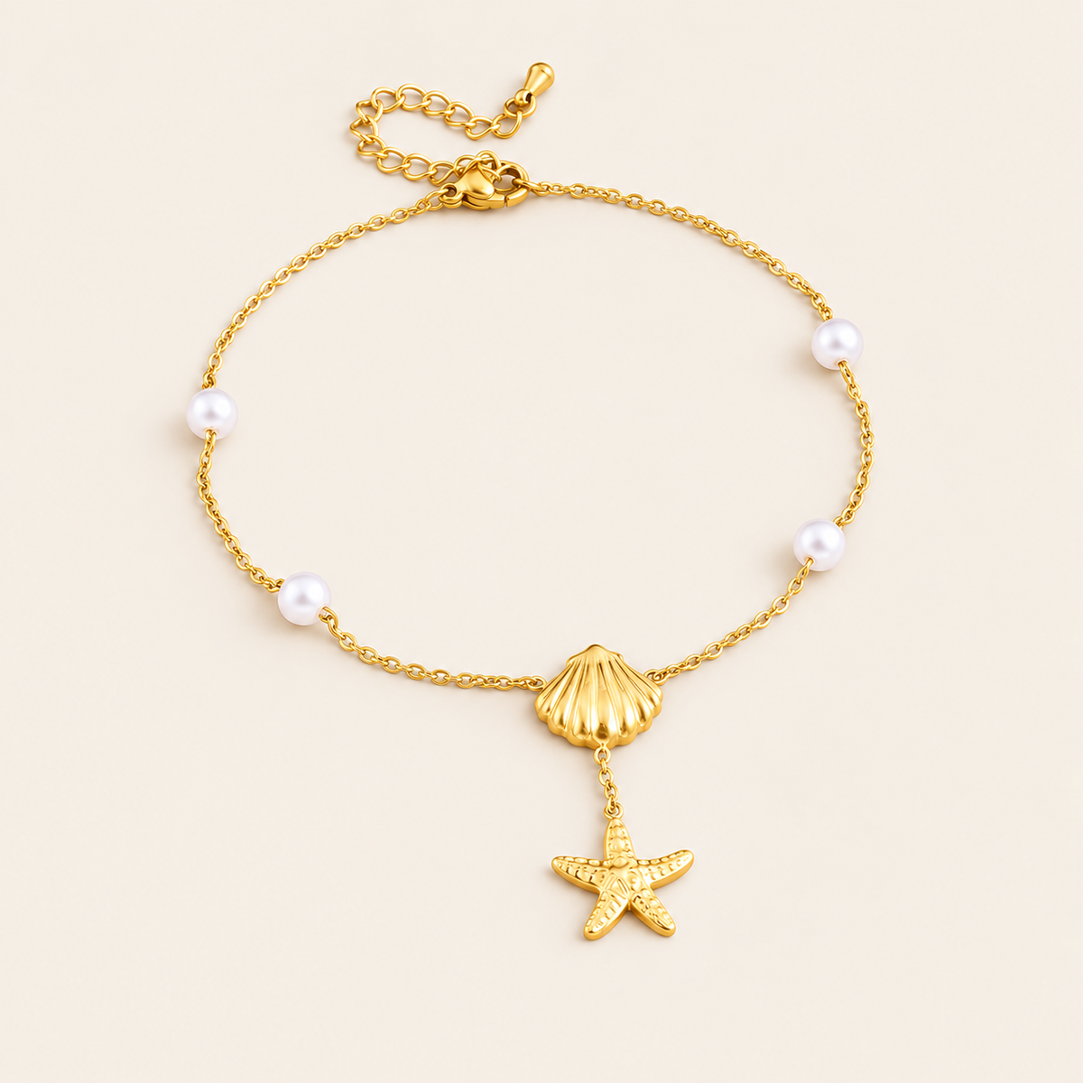 Shell Starfish Pearl Anklet — warm ivory background
