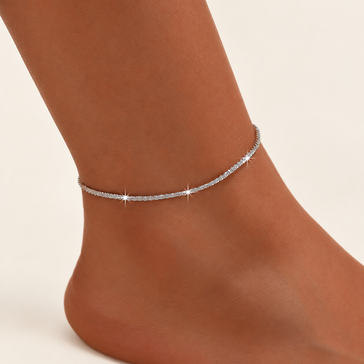 Silver Sparkle Chain Anklet — warm ivory background