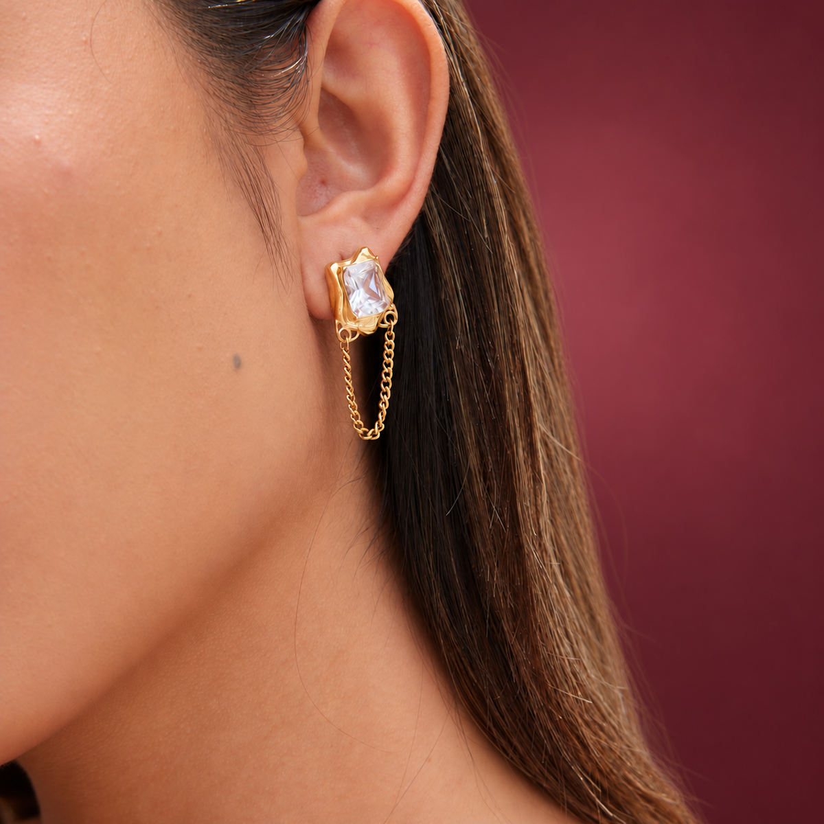Crystal Chain Drop Earring — muted burgundy background