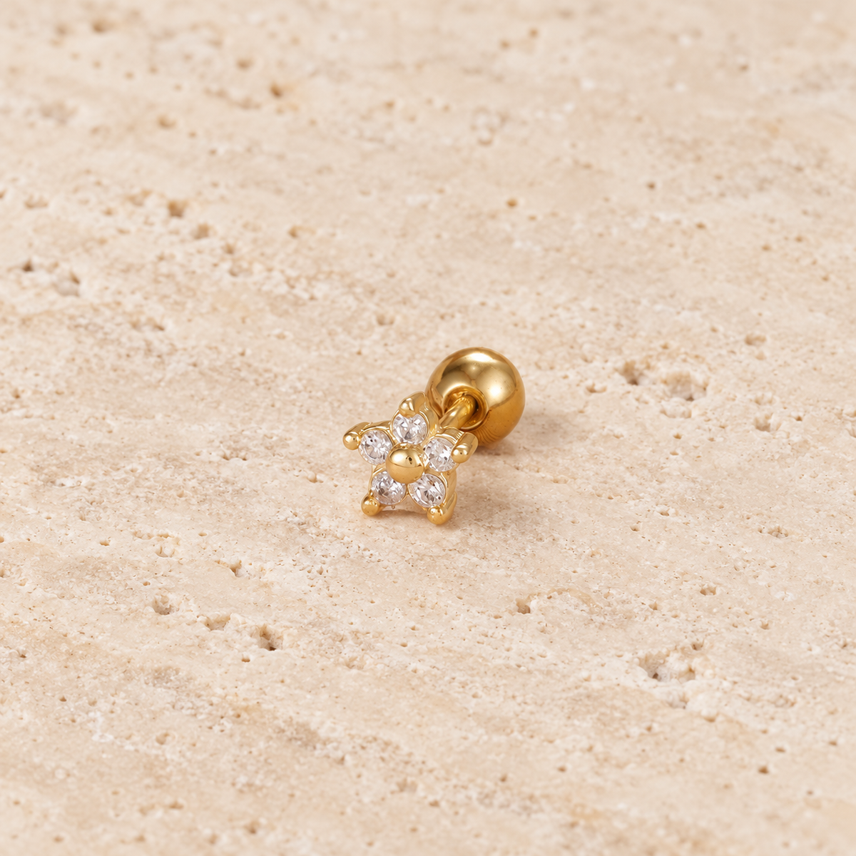 Crystal Flower Stud Earring — pale beige natural stone background