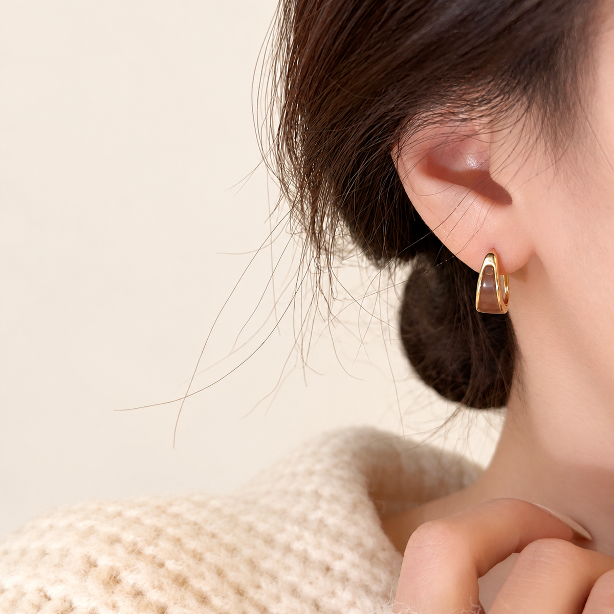 Gold Black Inlay Hoop Earring — warm ivory background