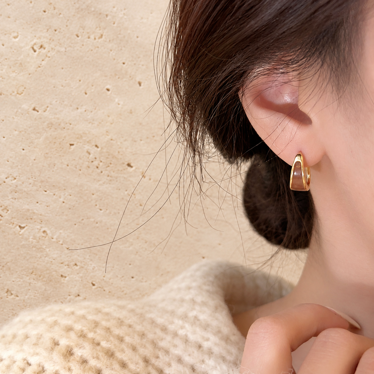 Gold Black Inlay Hoop Earring — pale beige natural stone background