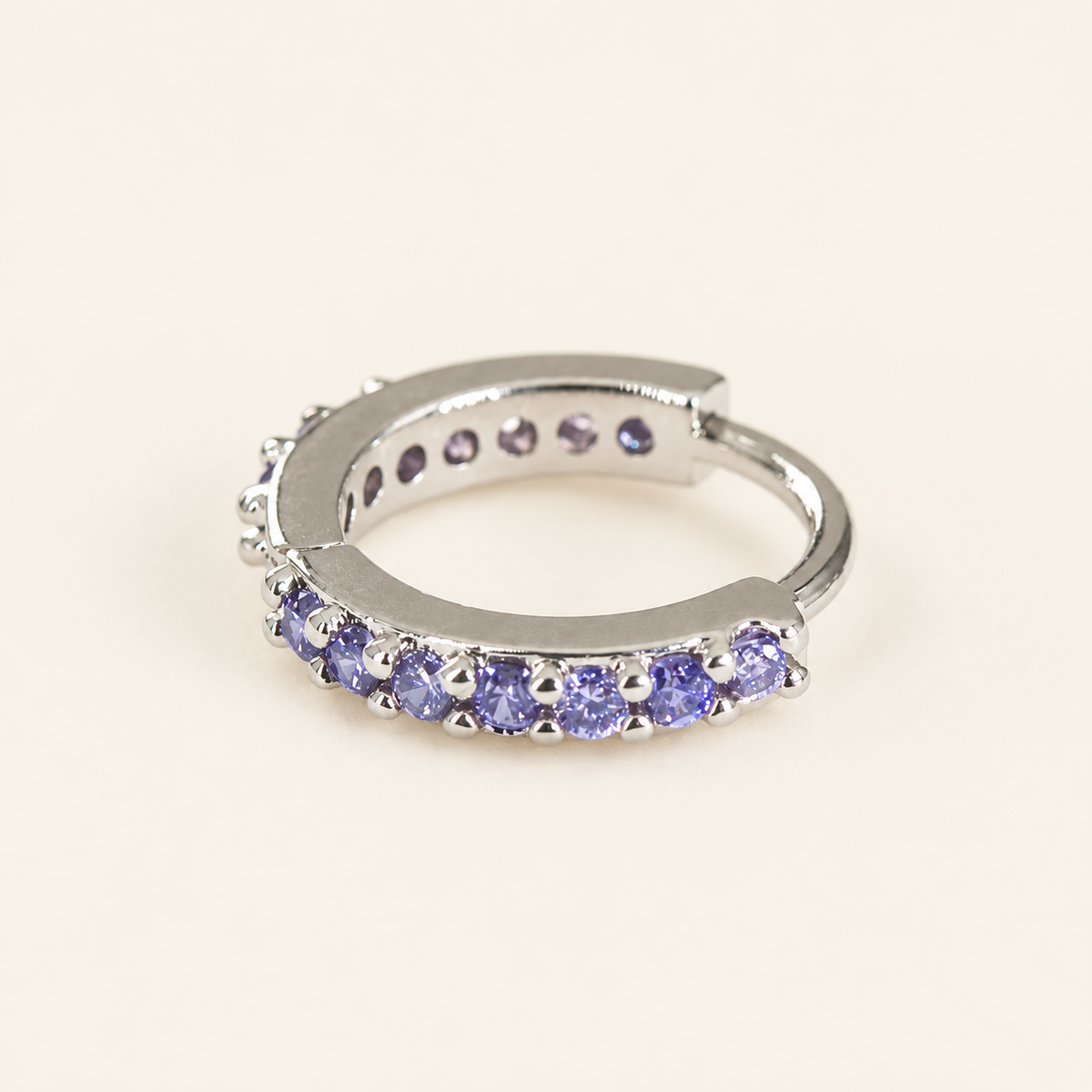 Purple Crystal Ear Cuff — warm ivory background
