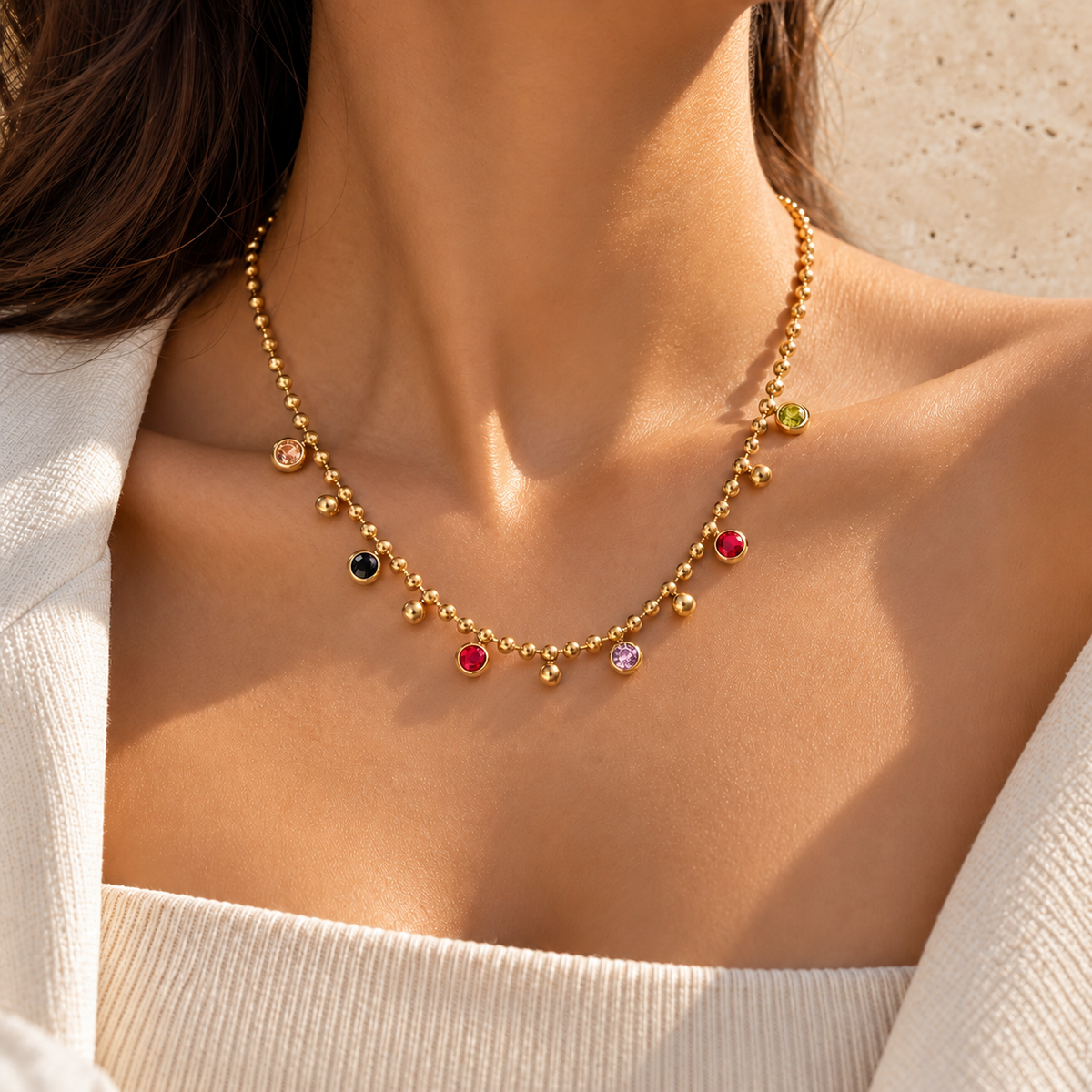 Rainbow Bezel Necklace — pale beige natural stone background