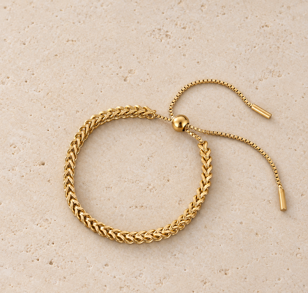 Gold Adjustable Wheat Chain Bracelet — pale beige natural stone background
