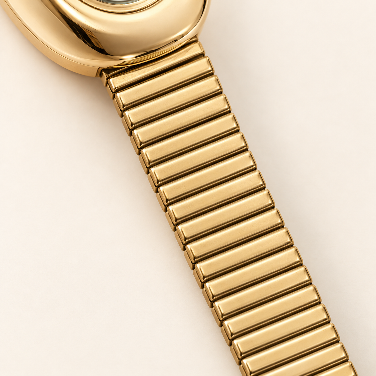 Garnet Oval Flex Watch — bracelet detail — warm ivory background