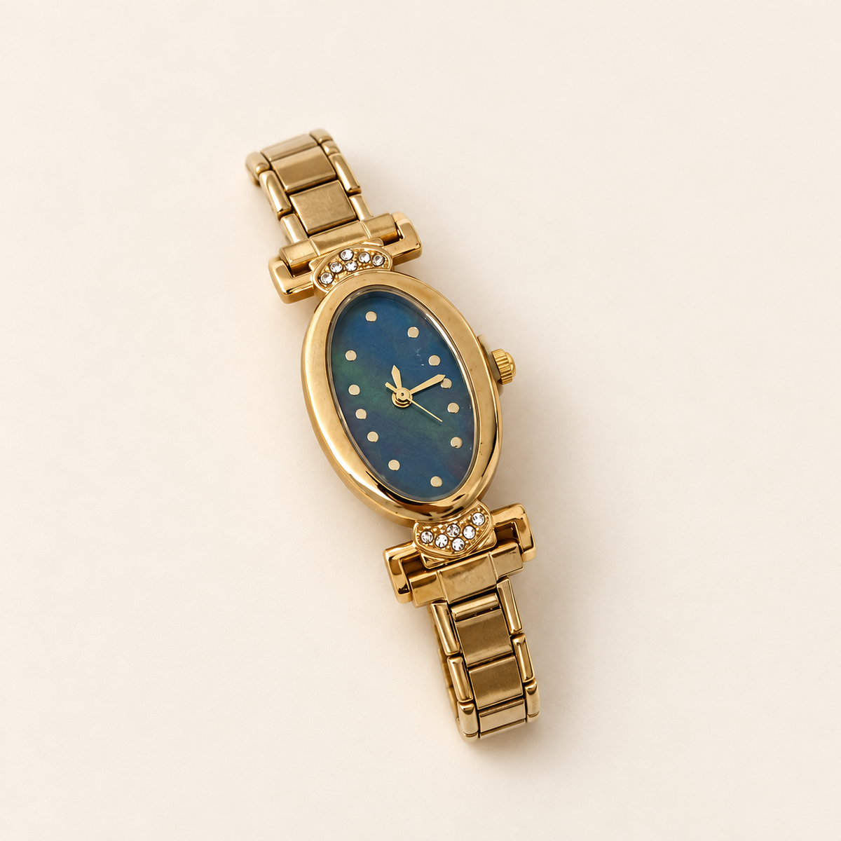 Azure Oval Link Watch — warm ivory background