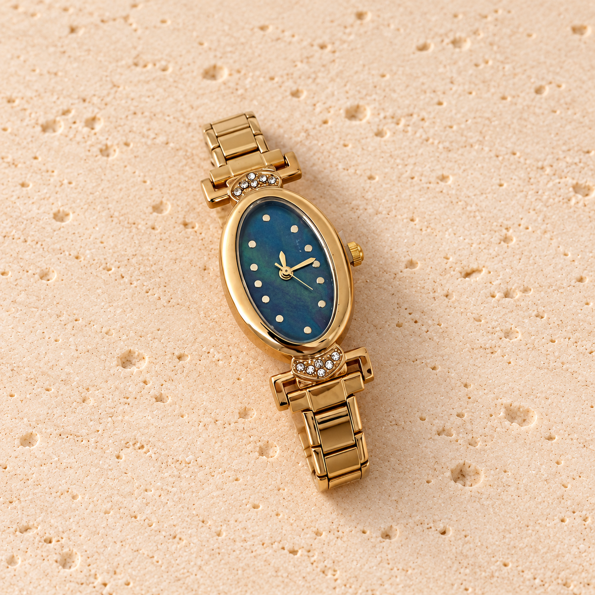 Azure Oval Link Watch — pale beige natural stone background