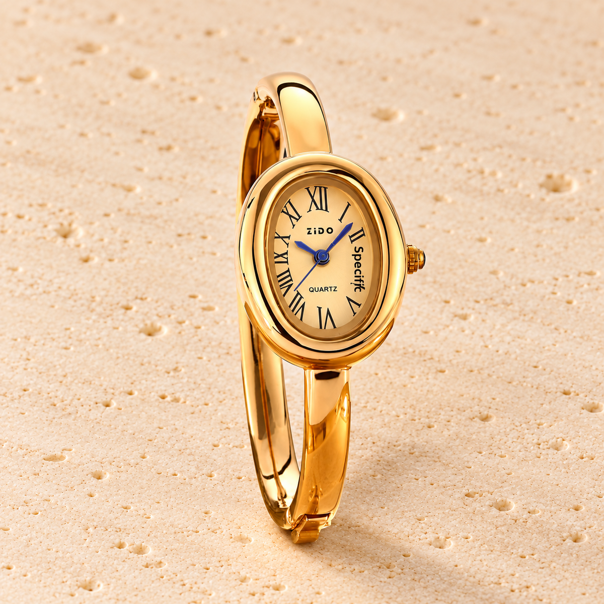 Lumiere Gold Cuff Watch — pale beige natural stone background