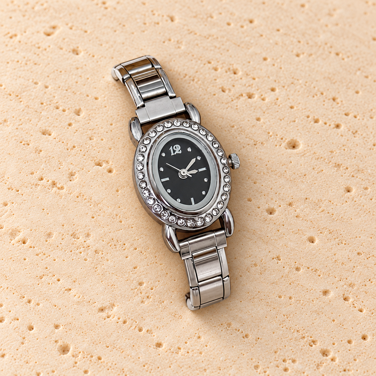 Starlight Oval Silver Watch — pale beige natural stone background