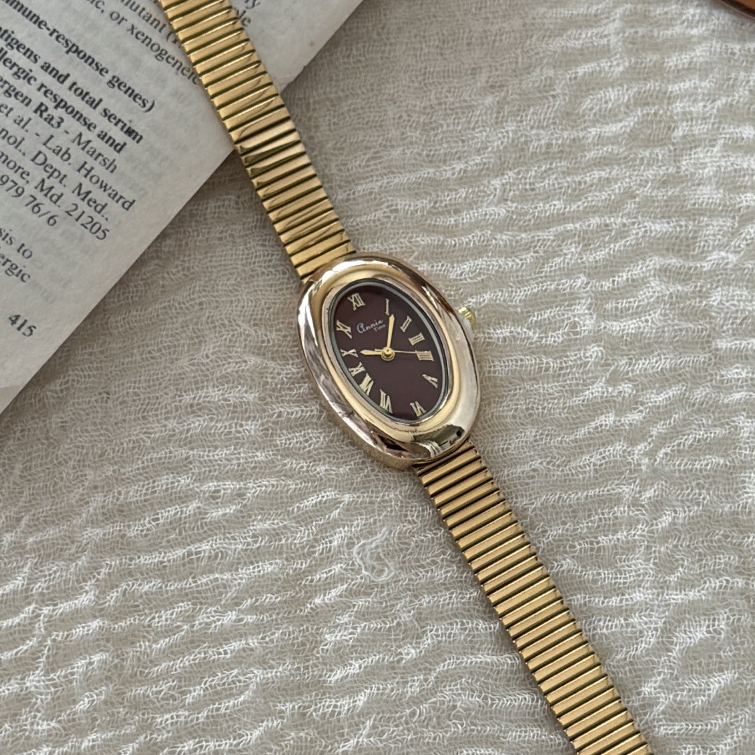 Garnet Oval Flex Watch — Gold-tone / Burgundy